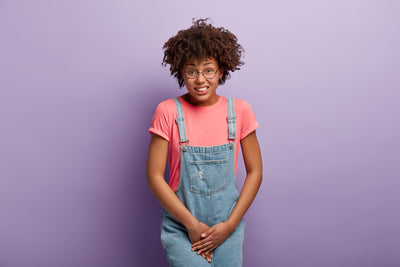 Young woman with UTI symptoms seeking virtual care